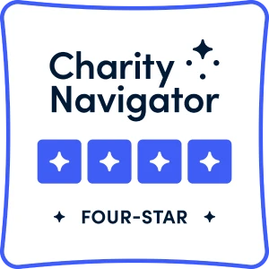 Charity Navigator emblem depicting a four-star rating granted to the Jewish Federation of Palm Beach County