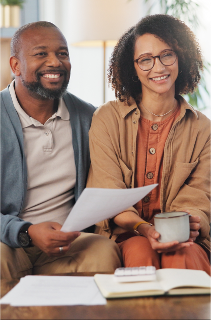 A couple speaking with a financial advisor